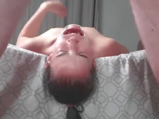 Upside down piss loving slut laying face down from bed swallows piss in two non identical camera angles